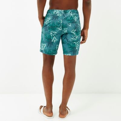Blue tropical print shorts